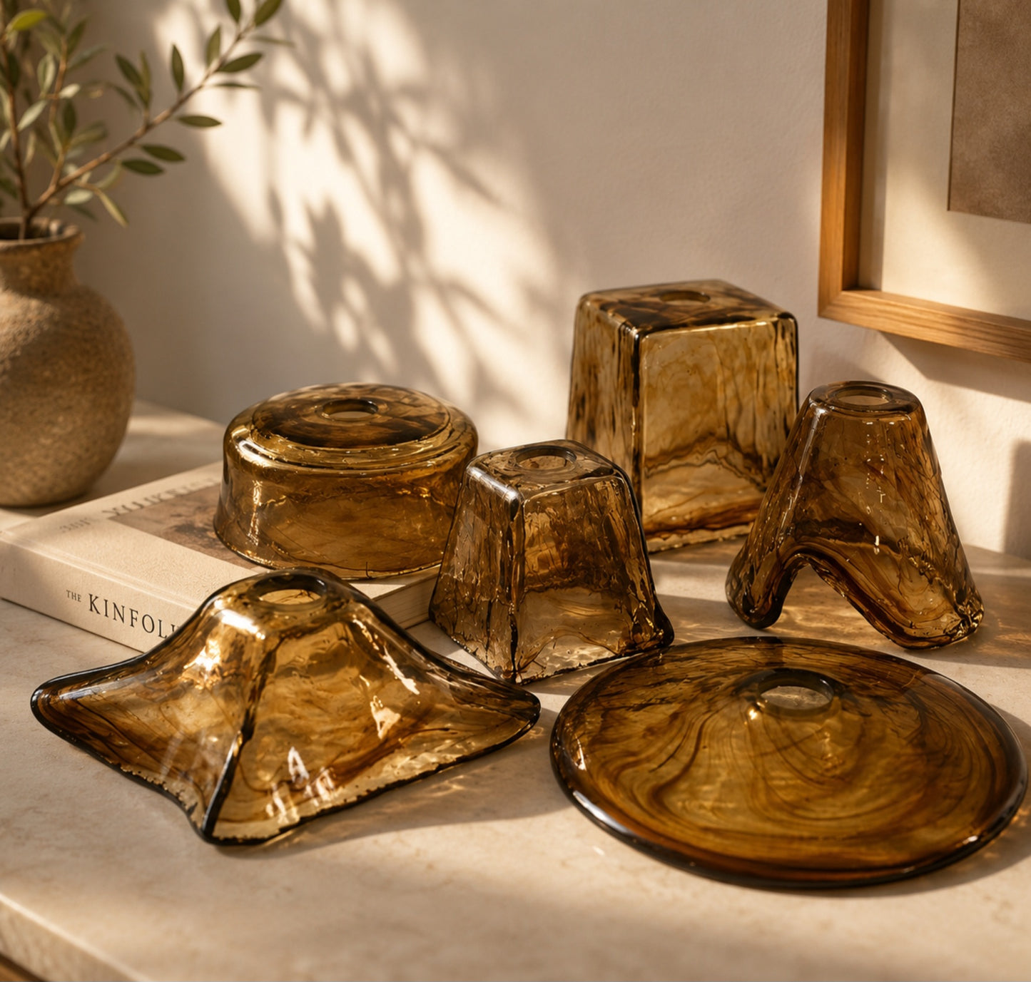 Amber glass lampshade variants including bell, square, flared and disc shapes for brass wall sconce