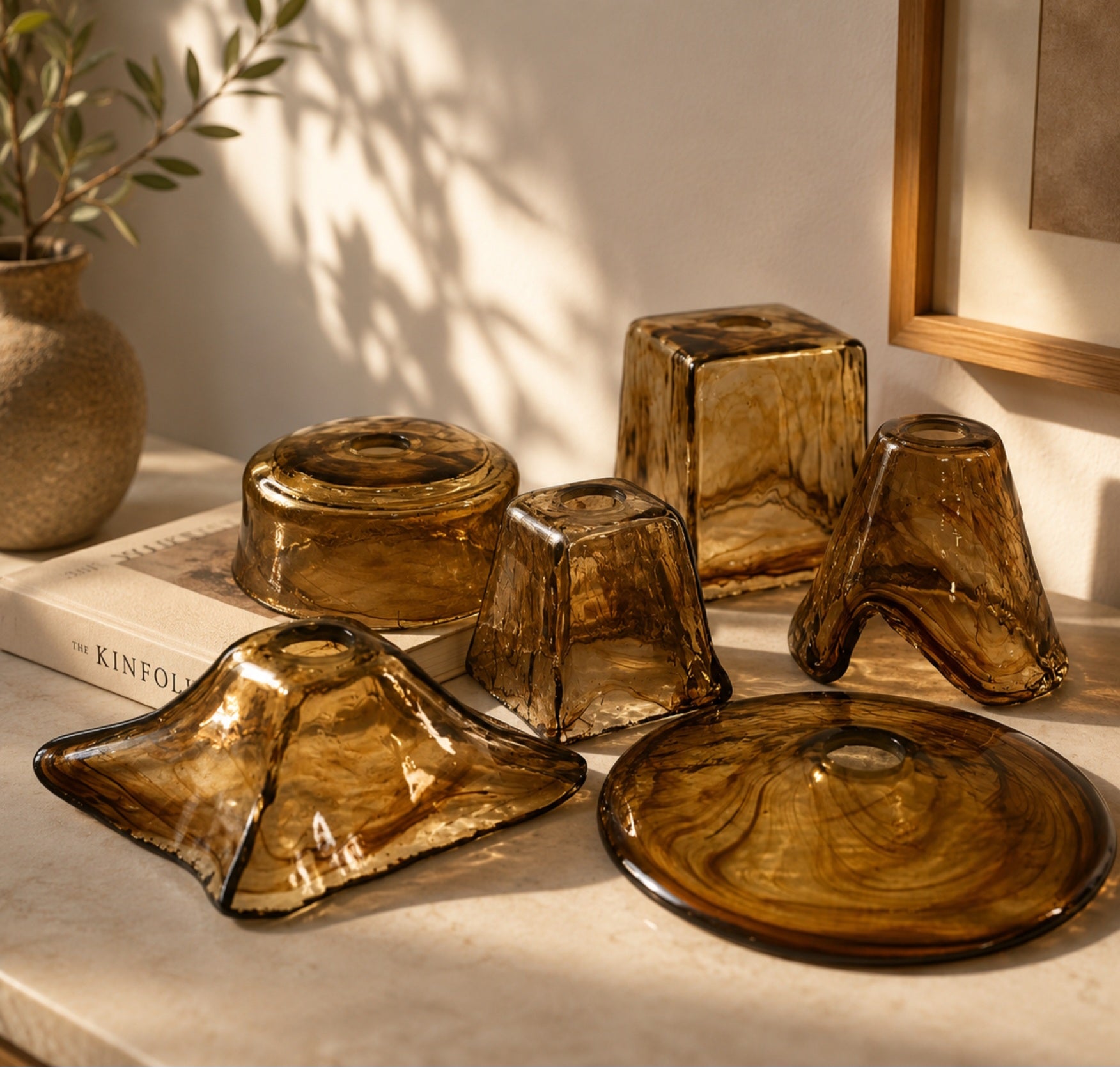 Amber glass lampshade variants including bell, square, flared and disc shapes for brass wall sconce